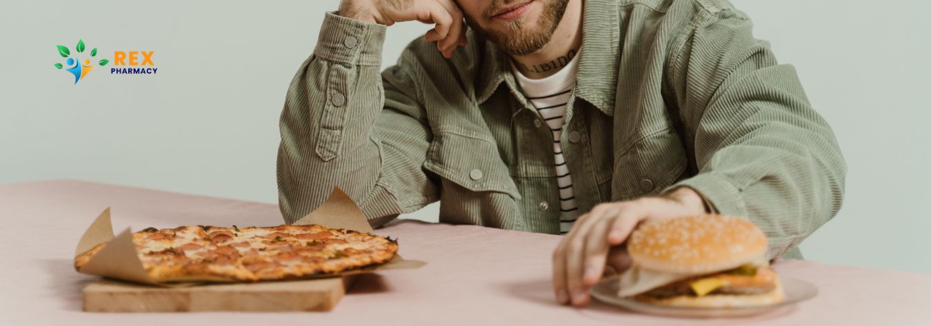 Man rejecting a pizza and burger during weight loss