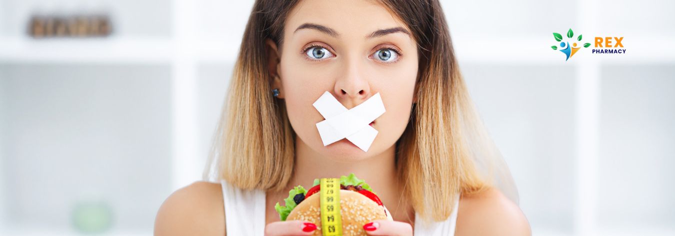 Woman with her mouth taped up to represent diet culture 